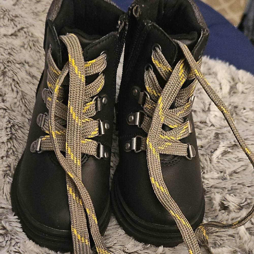 Girl, Black Stylish Boots. Gray Shoe string